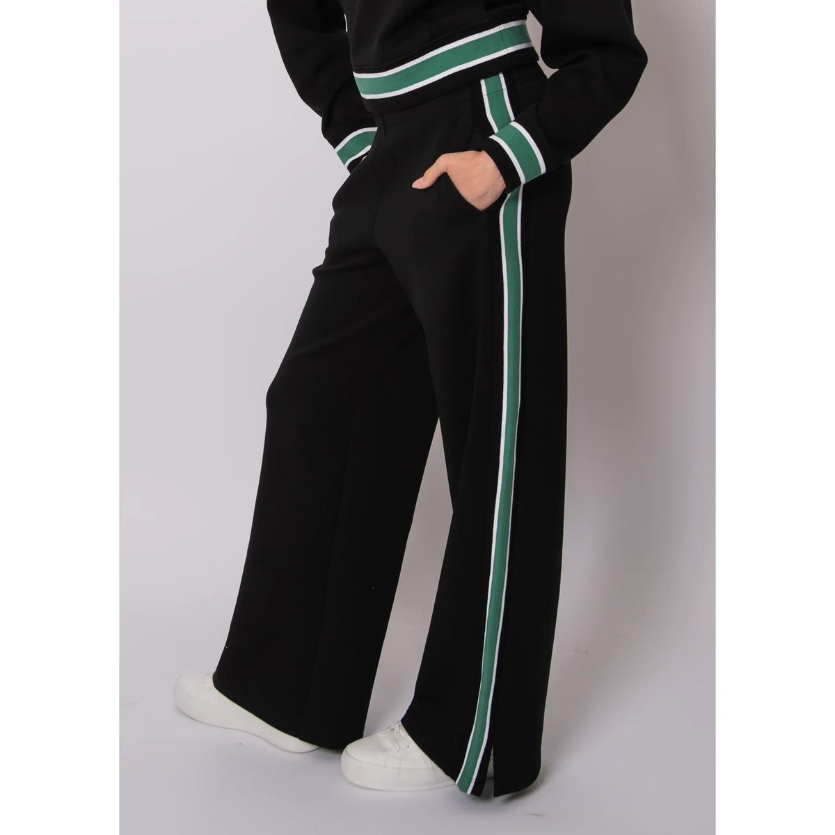 Valencia soft knit pull-on jogger pants with green and white side stripe on black fabric.