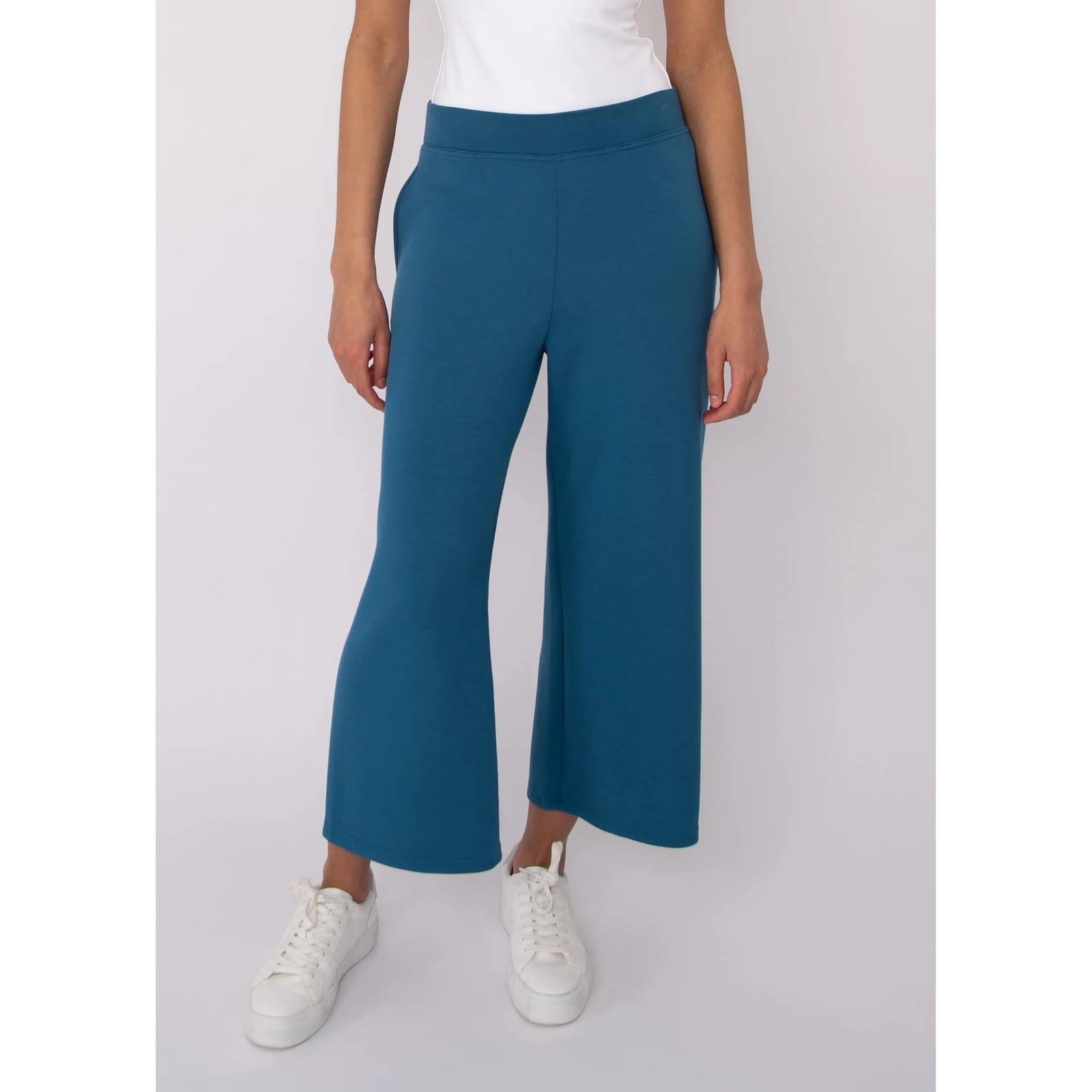 Victoria Soft Knit Cropped Pants in teal, wide-leg with pockets, modeled in size Small.