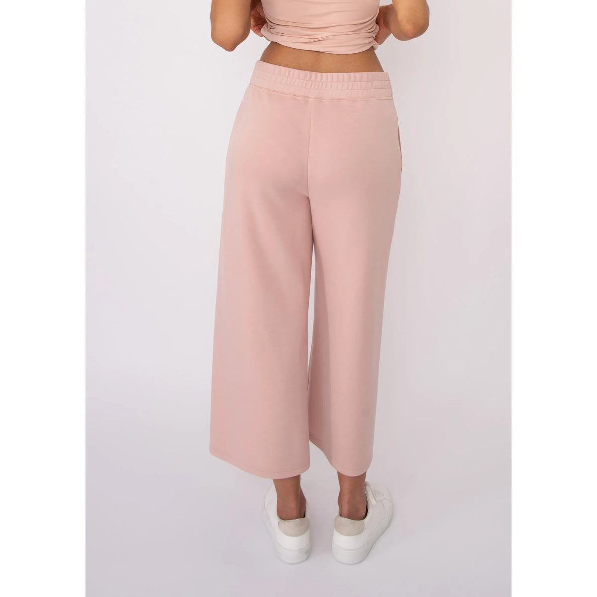 Victoria Soft Knit Cropped Pants in blush pink with elastic waistband and wide legs, shown on Sharlene in size Small.