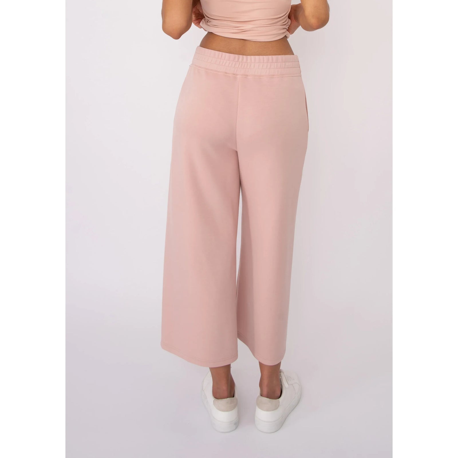 Victoria Soft Knit Cropped Pants in blush pink with elastic waistband and wide legs, shown on Sharlene in size Small.