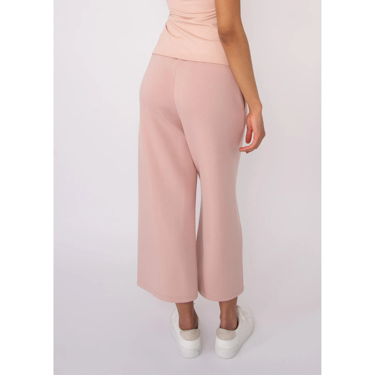 Victoria Soft Knit Cropped Pants in blush pink with a wide leg and pockets, worn by Sharlene in size Small