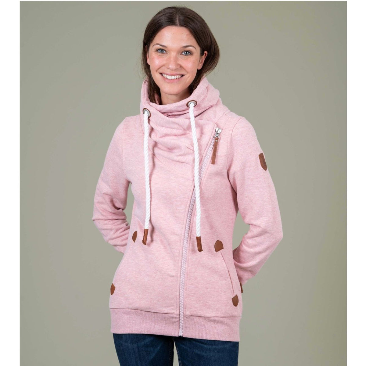 Wanakome Hestia Zip Up pink heather fleece hoodie on model with white drawstrings, cozy funnel neck.