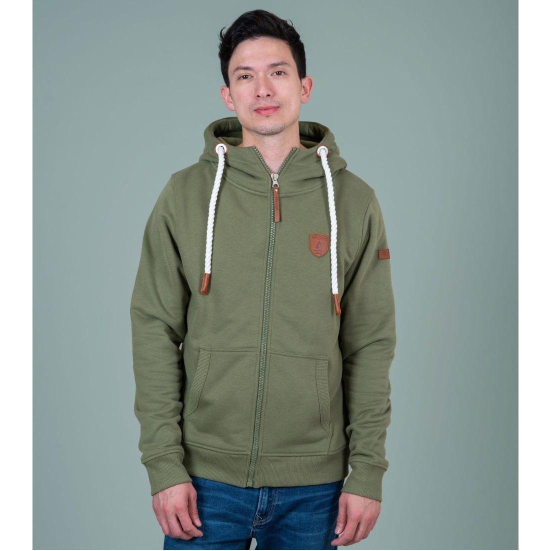 Wanakome Zeus Hoodie in olive green with white rope drawstrings and faux leather accents.