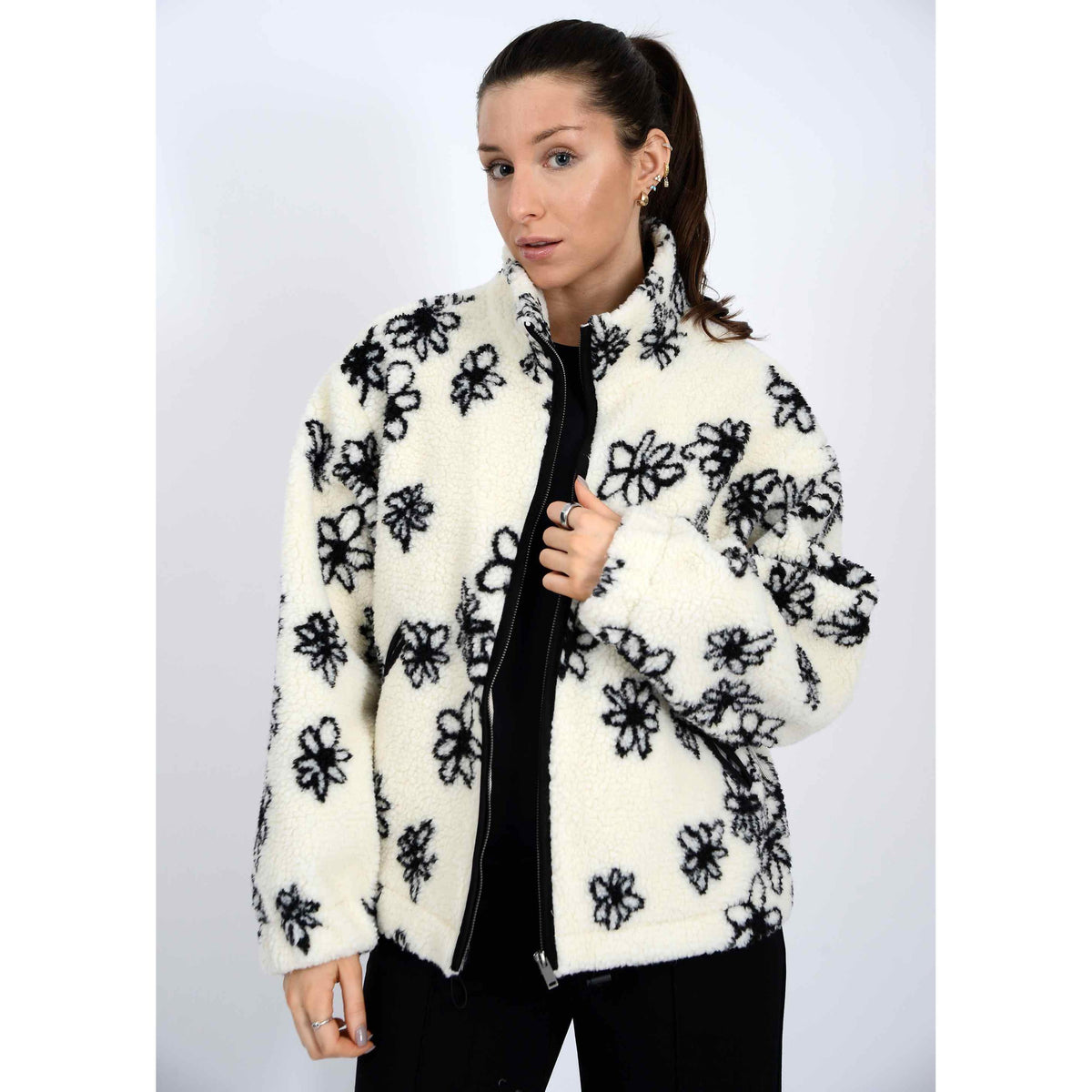 Whistler Sherpa Jacket with bold mock collar, secure zipper, floral fleece pattern, cozy winter outerwear.
