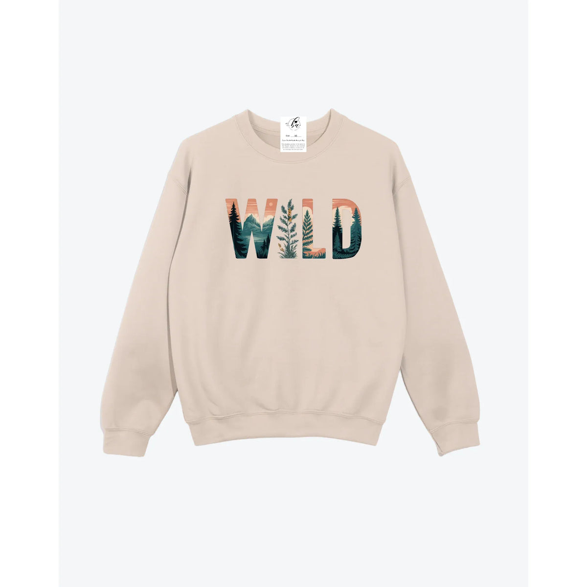 Wild Cozy Crew beige crewneck sweater with forest landscape inside WILD lettering, unisex fit.
