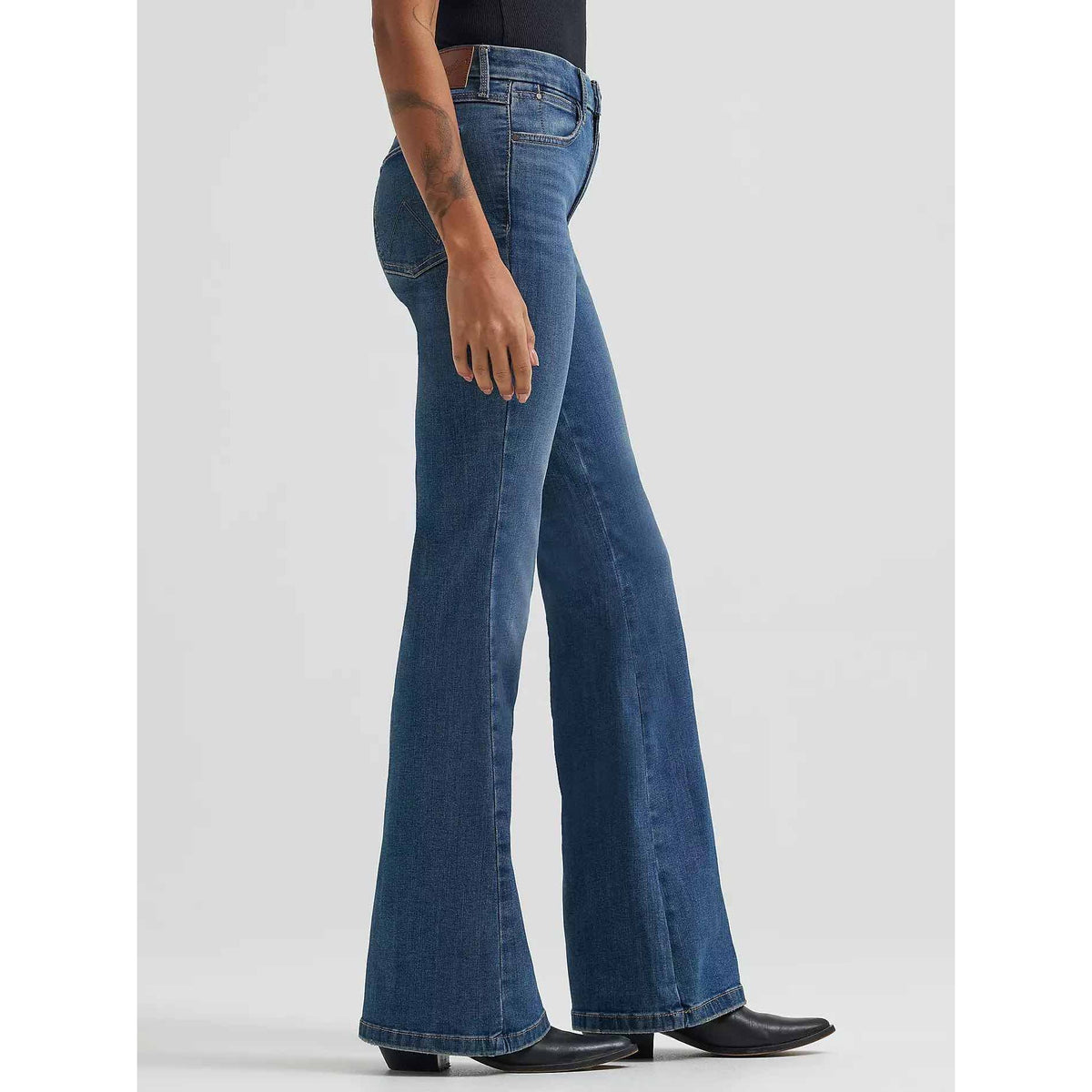 Wrangler Bespoke Lily High-Rise Flare Jeans with sculpting silhouette, contoured waist, angled back pockets.