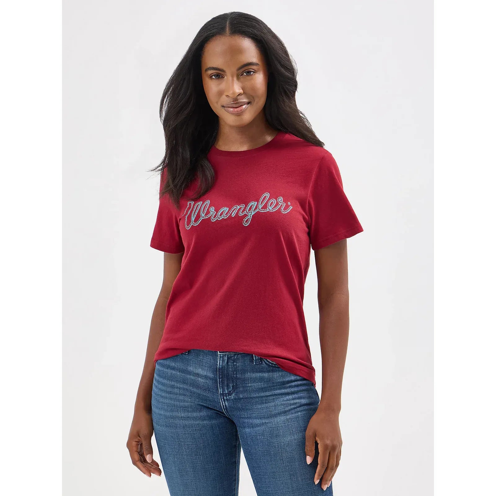 Model wearing a red Wrangler Rope Logo Tee with a light-blue rope-script across the chest.