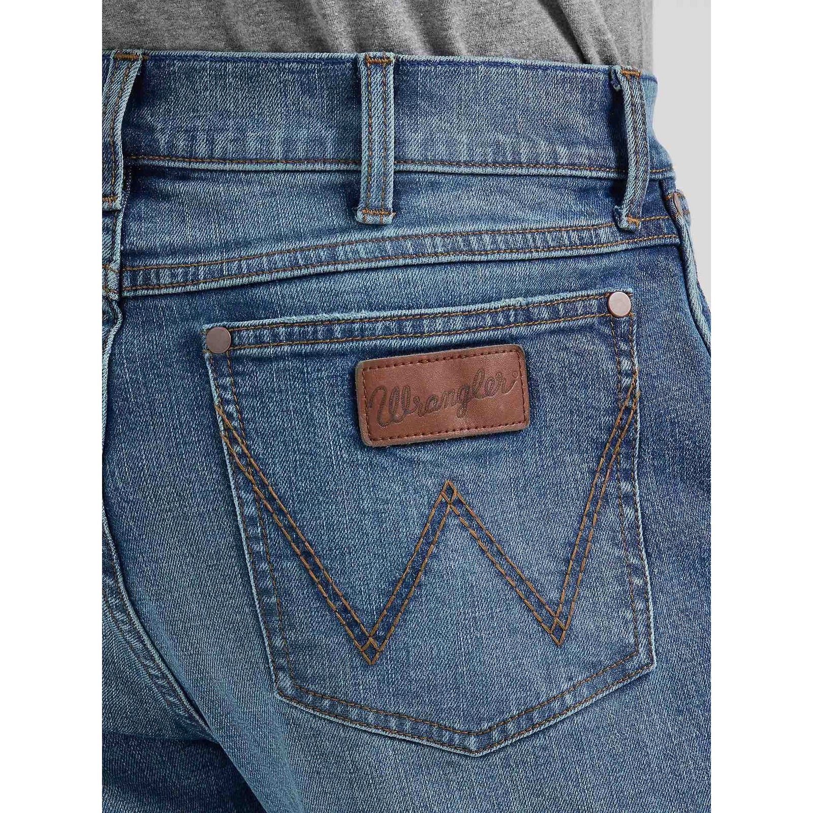 Back view of Harris Wrangler Western Retro Slim Boot jeans with leather patch and W stitching.
