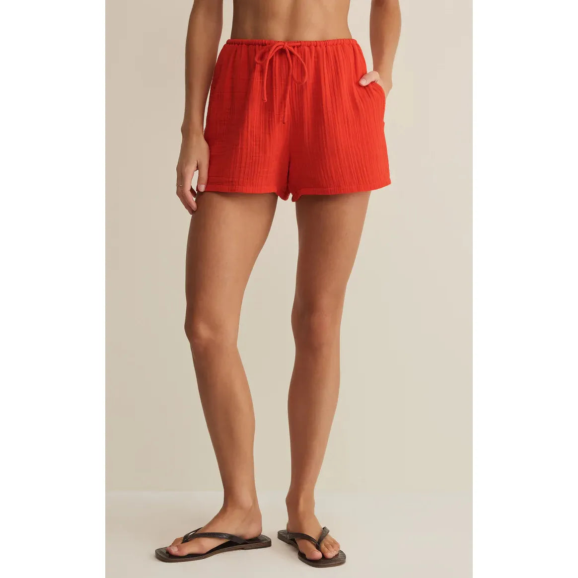 Z Supply Daylight Airy Shorts in red lightweight cotton with drawstring waist and side pockets.