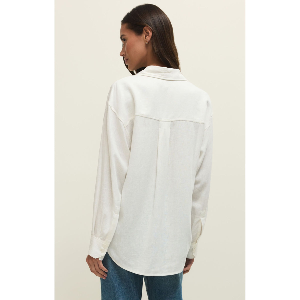 Z Supply Alfie Button Up Shirt in white linen with relaxed drape, long sleeves, classic collar, back view.