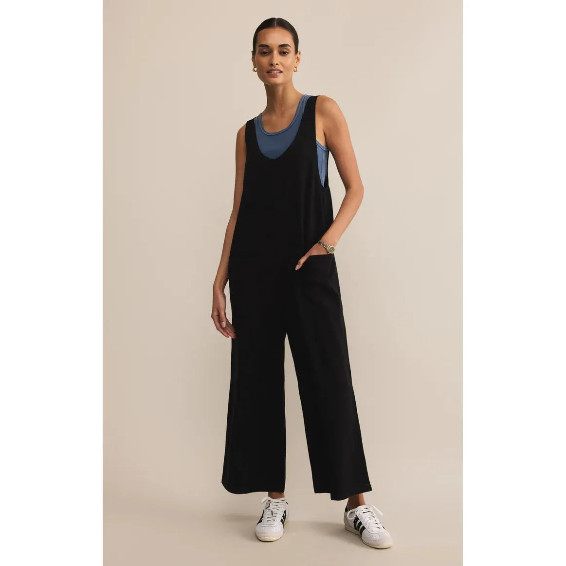 Z Supply Brasilia Everyday Jersey Jumpsuit in black with wide straps, scoop neck, and patch pockets.