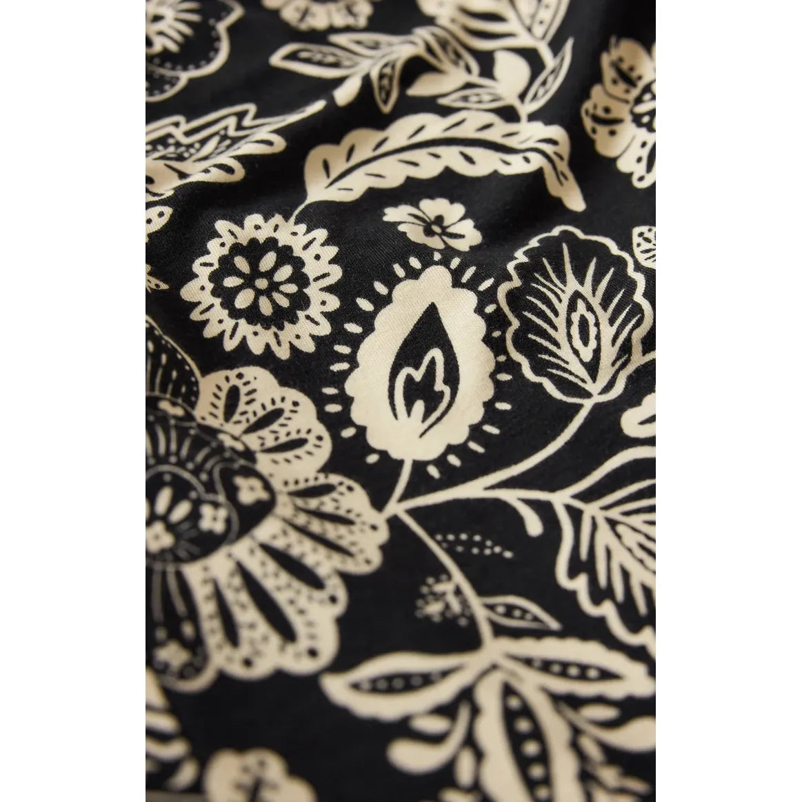 Z Supply Day Off Luz Jumpsuit floral black-and-cream print on signature soft stretch jersey fabric.