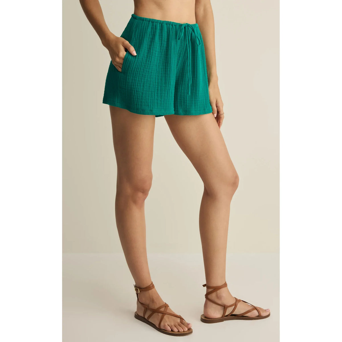 Z Supply Daylight Airy Shorts in teal with lightweight crinkle cotton, drawstring waist, and functional side pockets.