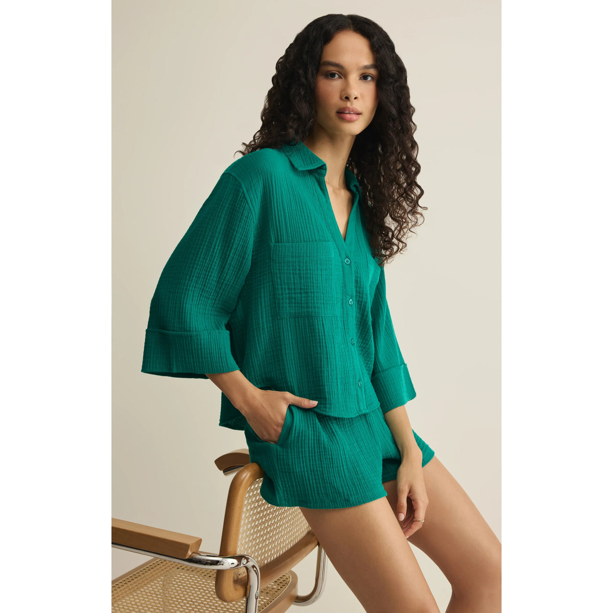 Z Supply Helena Shirt in teal green, textured, relaxed-fit button-up blouse worn by a model.