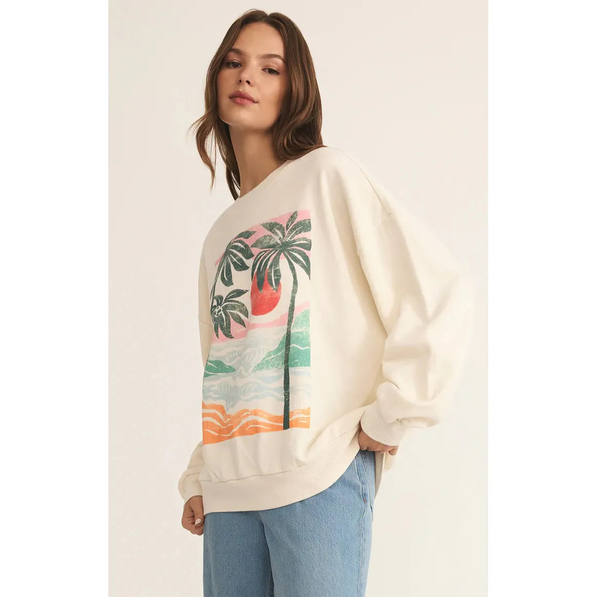 Embrace cozy comfort with the Z Supply High Tide Sunday Sweatshirt featuring a vibrant beach-inspired print.