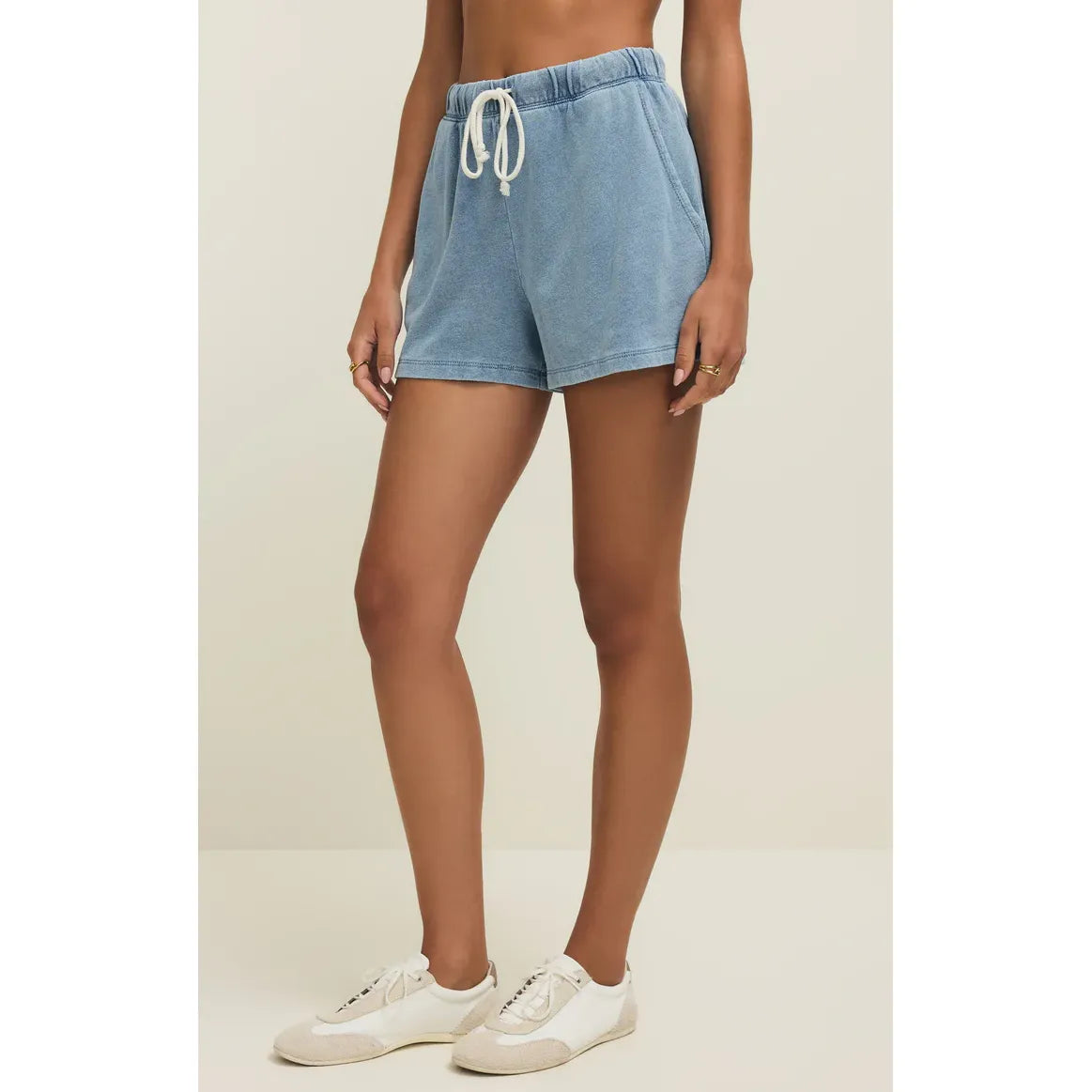 Z Supply Hunter Knit Denim Shorts in light wash with white drawstring, high-rise, slash pockets, worn-in vibe.