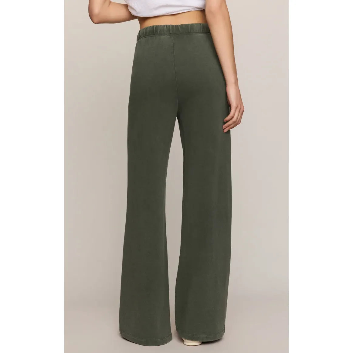 Back view of olive green Z Supply Hunter Knit Pants. Mid-weight cotton French terry with wide leg flare and elastic waistband for relaxed comfort.