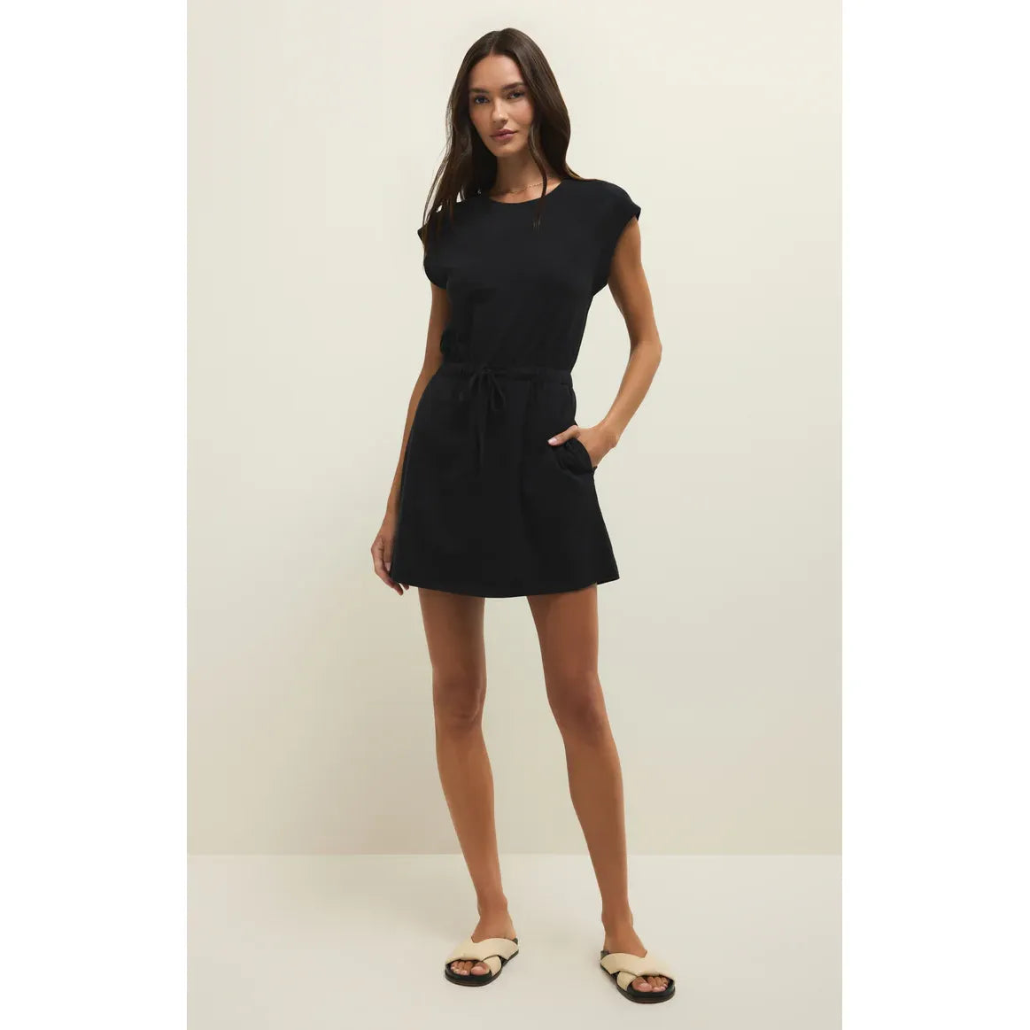 Z Supply Kalani Mini Dress in black; lightweight cotton jersey, short sleeves, elastic waist, relaxed fit, pockets.