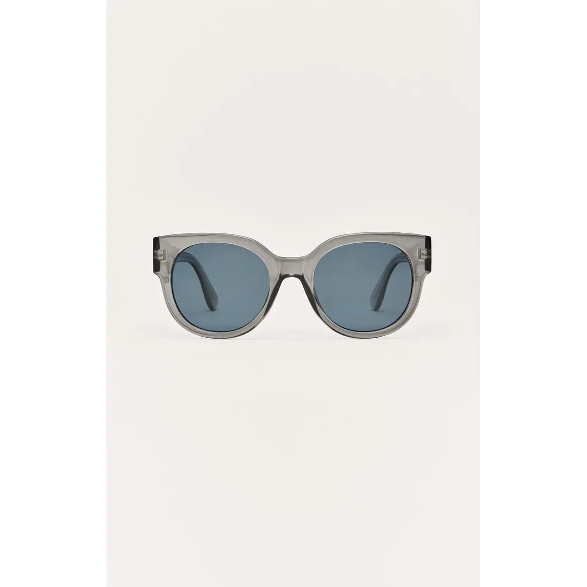 Z Supply Lunch Date sunglasses with translucent gray frame and blue lenses, rectangular faces, UV protection.