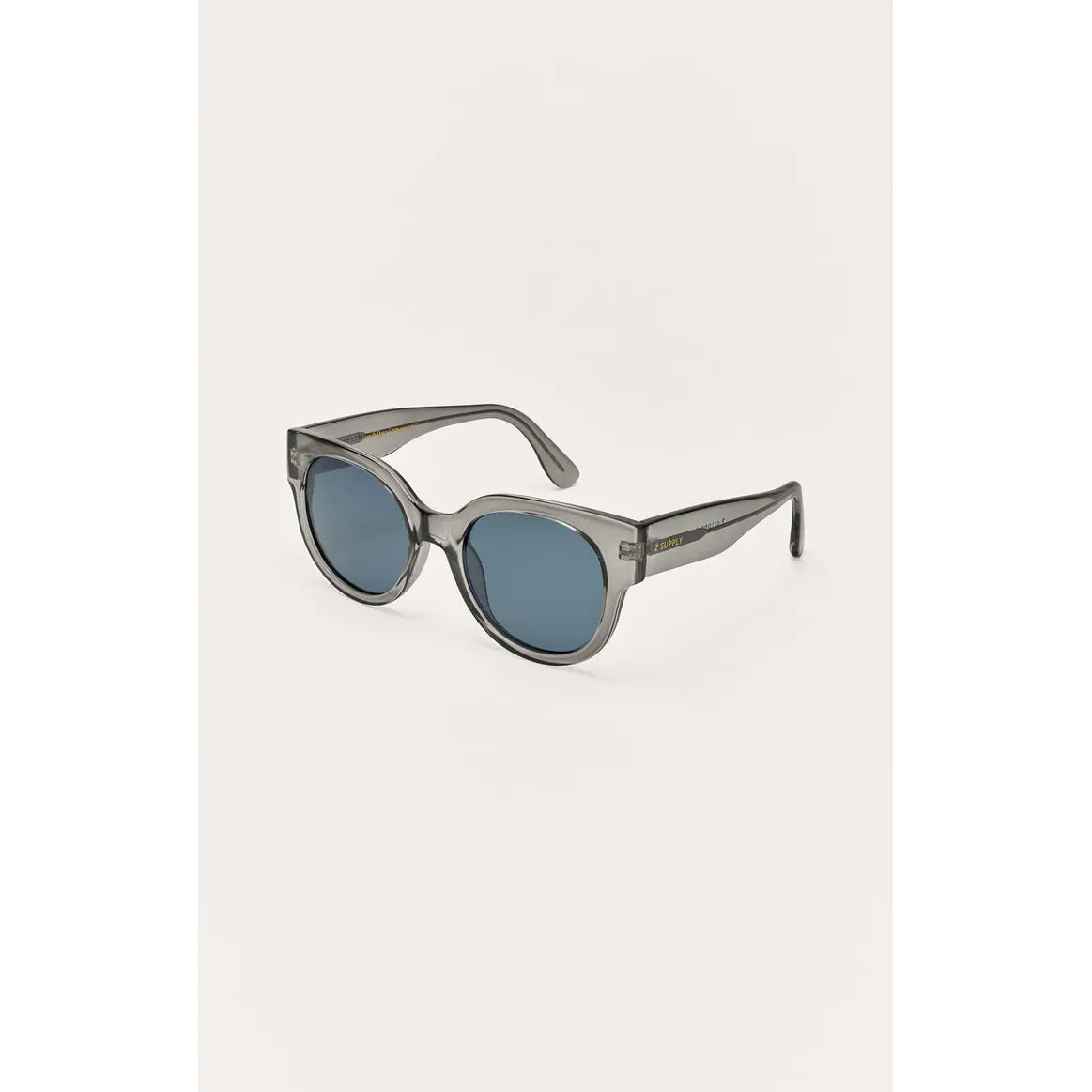 Z Supply Lunch Date sunglasses with translucent gray frame, blue lenses, medium size, 100% UVA, UBC & UVC protection.