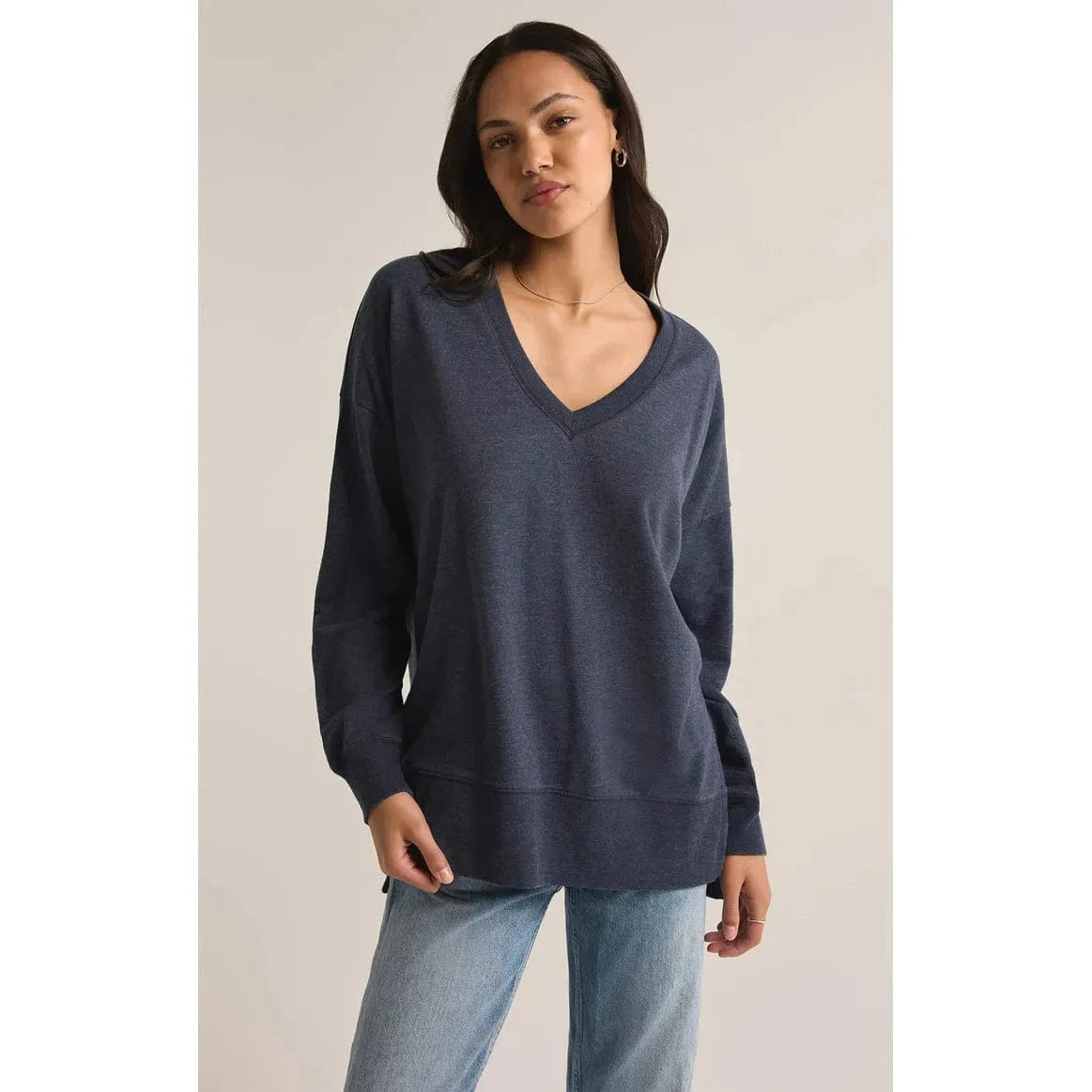 Z Supply Modern V-Neck Weekender Top in eclipse navy, oversized relaxed long-sleeve V-neck worn by model.