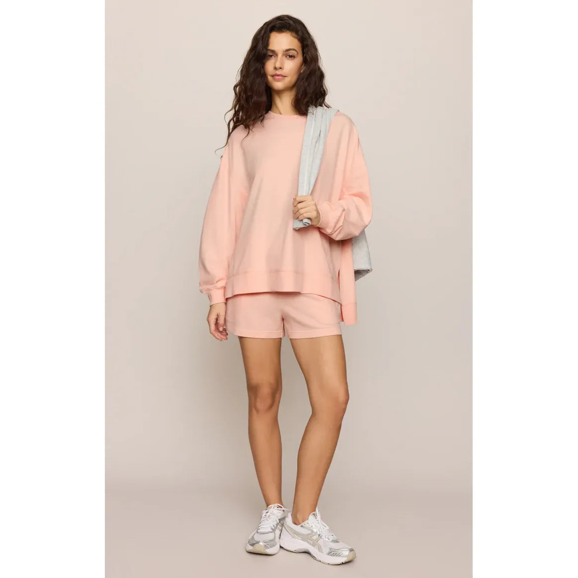 Peach pink Z Supply Modern Weekender Sweatshirt with matching shorts worn by a model