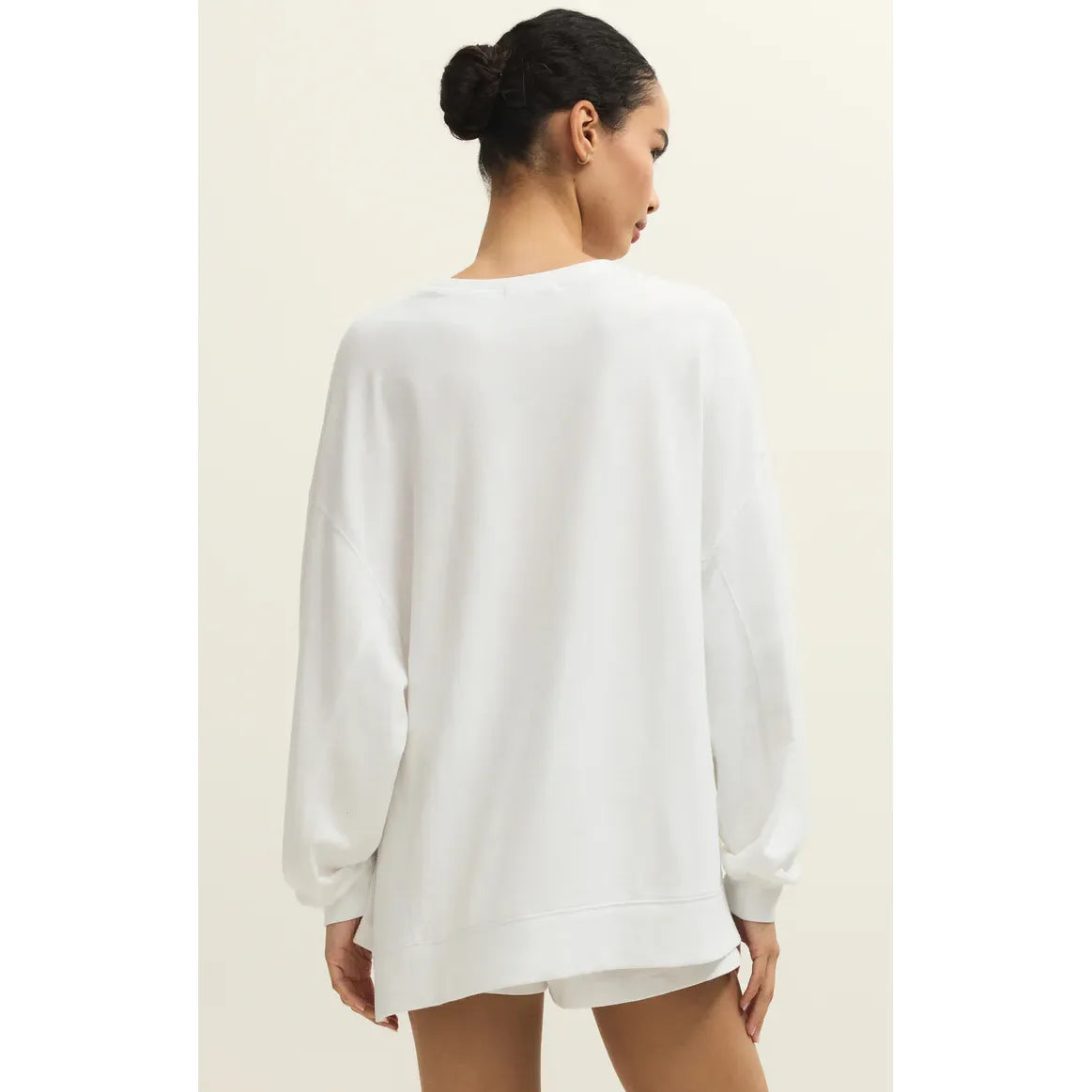 Z Supply Modern Weekender Sweatshirt in white, relaxed-fit long-sleeve crewneck, back view on model.
