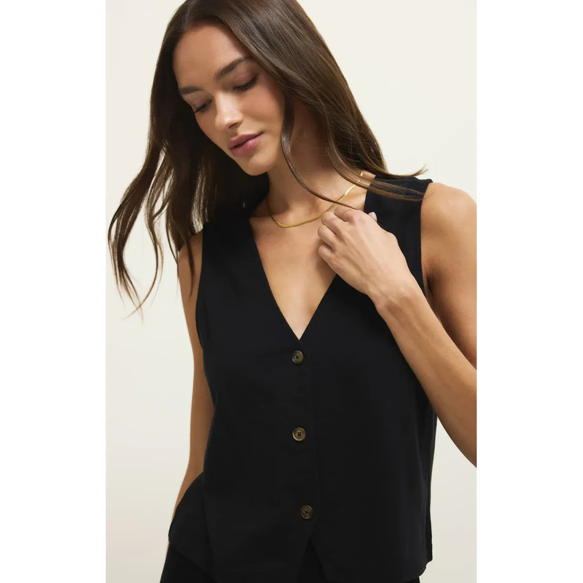 Black Z Supply Noelle jersey sleeveless top with V-neck and front buttons worn by a model.