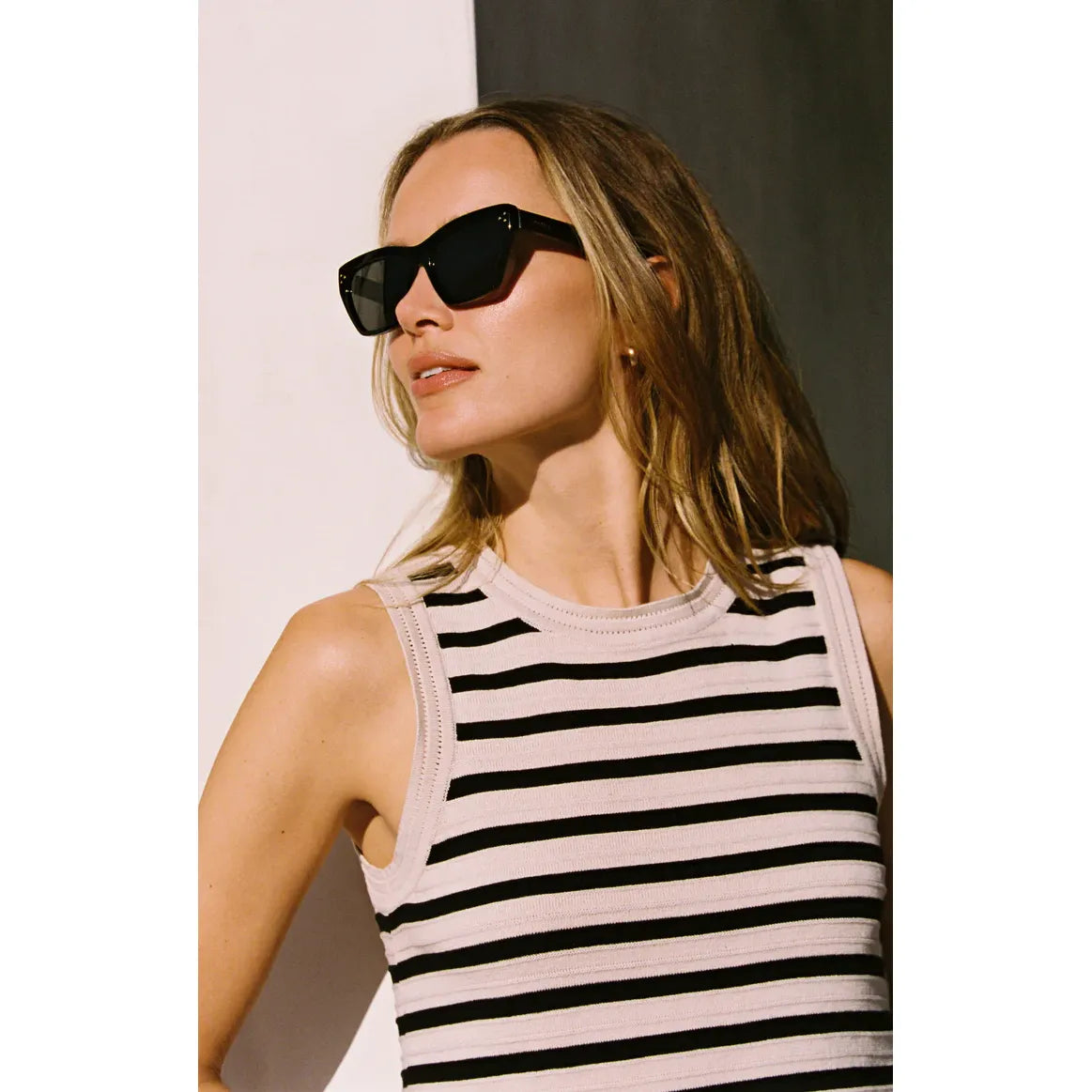 Z Supply Park Avenue Sunglasses on a model; medium-sized, chic rectangular frame with polarized lenses.