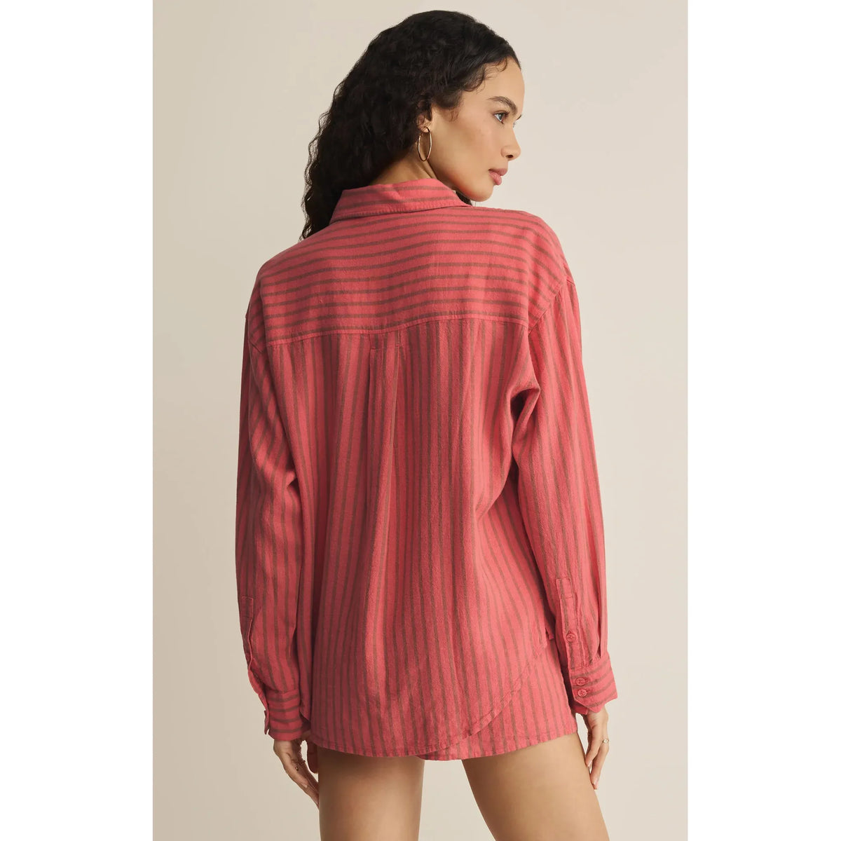 Z Supply Perfect Striped Button Up Top in coral-pink linen with vertical stripes, back view showing curved hem.