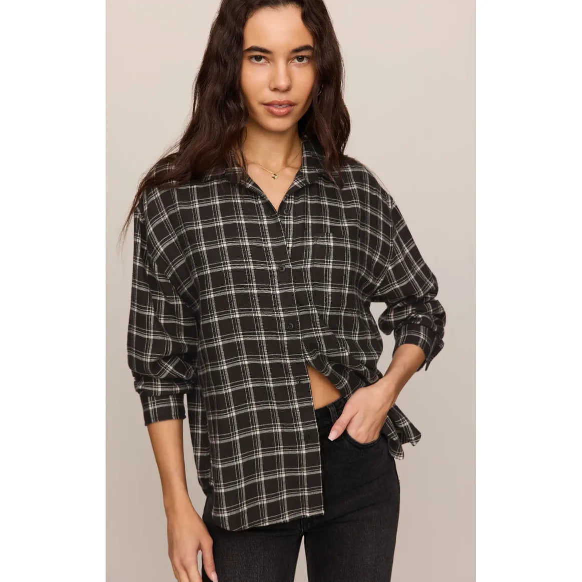 Z Supply River Plaid Button Up in Chocolate Cherry worn by model; relaxed black plaid shirt with rolled sleeves.