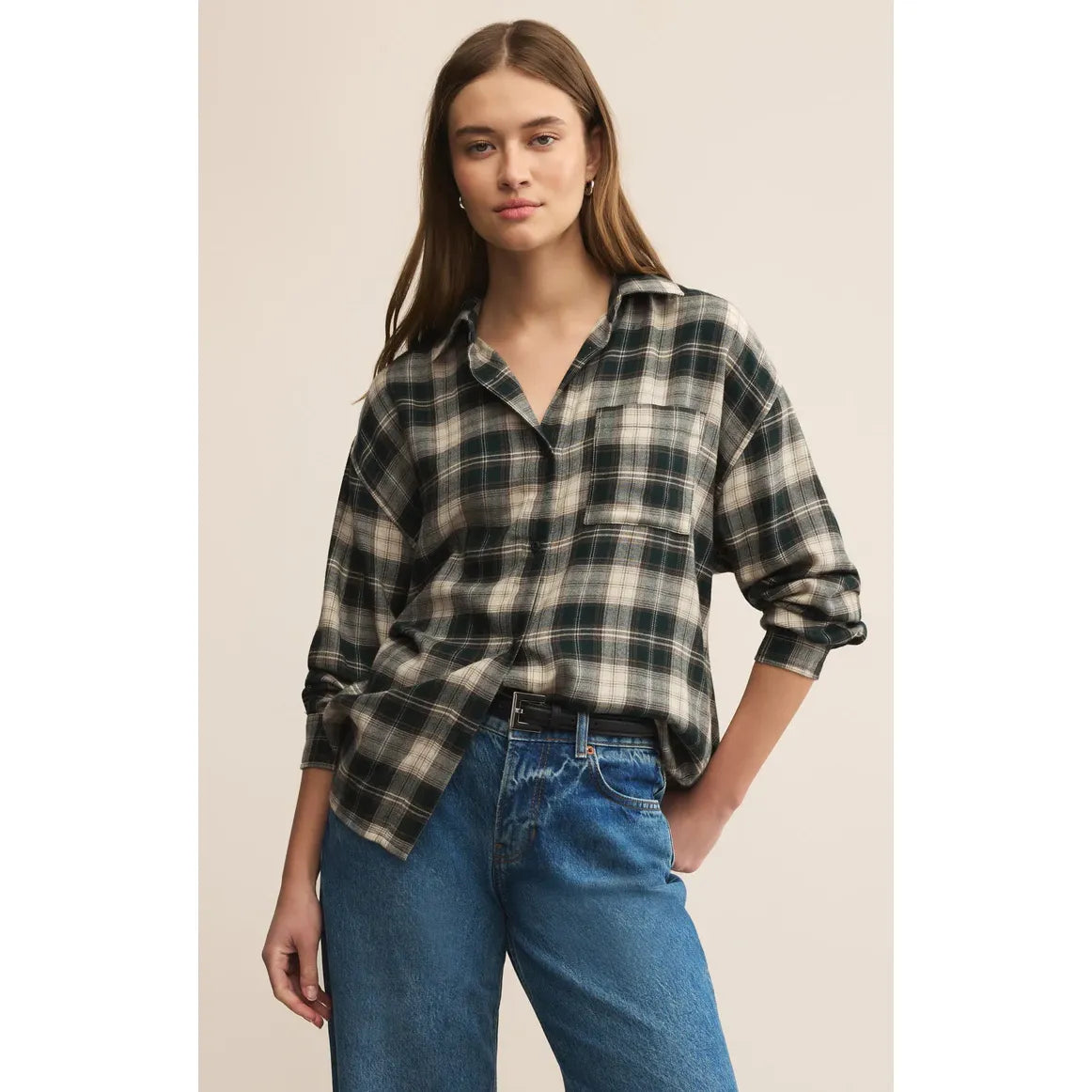 Z Supply River Plaid Button Up Top worn by a model in a relaxed, breezy plaid shirt; size small.