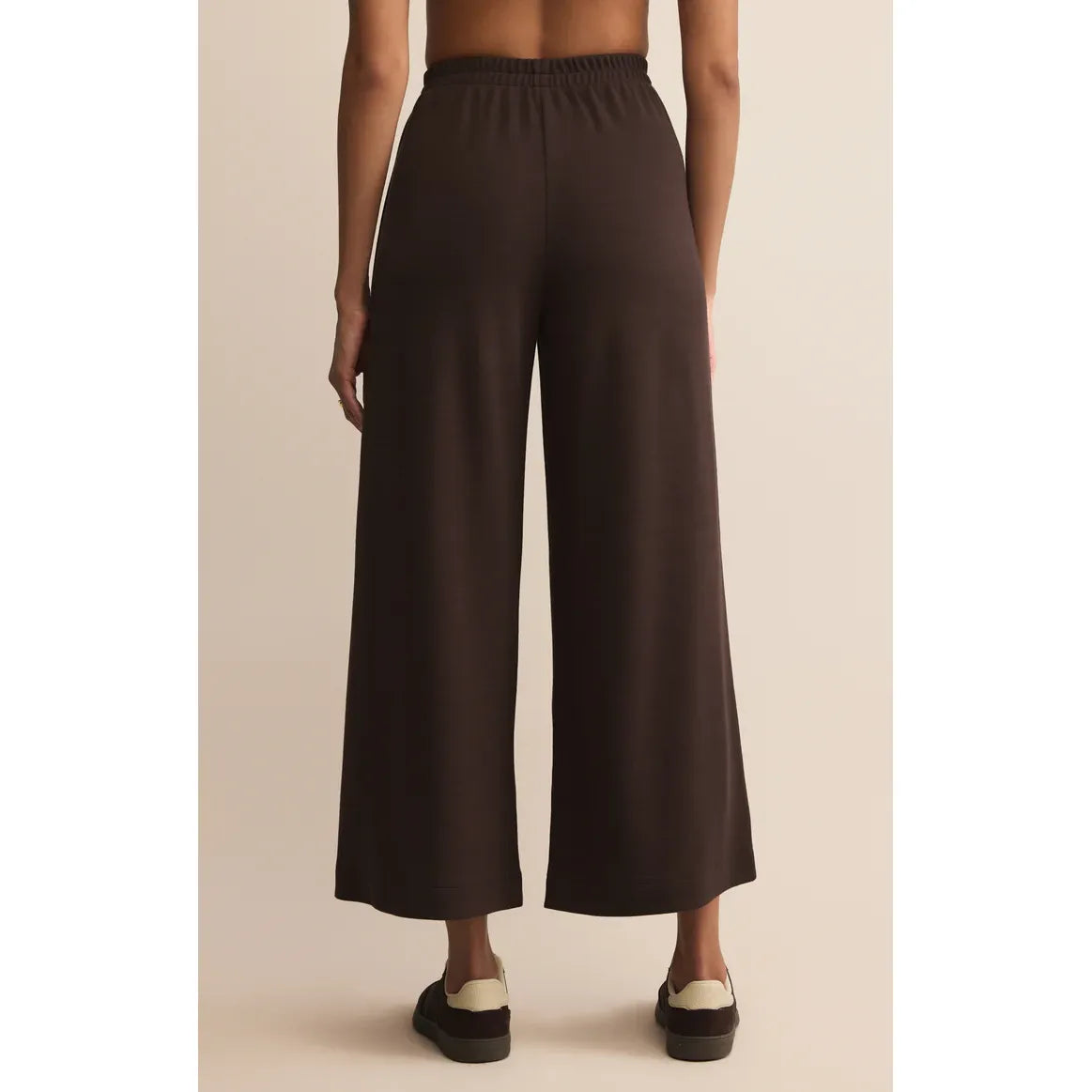 Back view of model in Z Supply Scout Luxe Pant, cocoa ribbed knit, high-rise, ankle-length wide-leg fit.