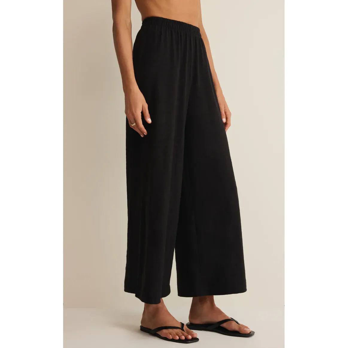 Z Supply Scout Textured Slub Pant in black, high-rise with elastic waistband, ankle-length wide-leg.