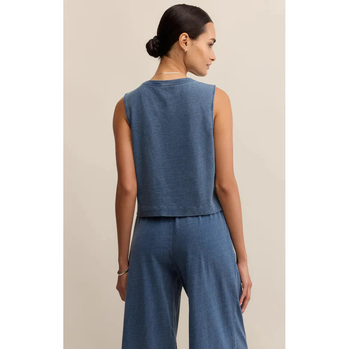 Z Supply Sloane Washed Jersey Tank, back view on model in vintage indigo knit tank with denim look and stretch