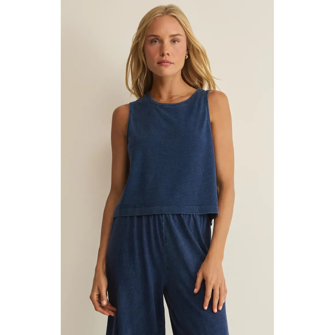 Z Supply Sloane Washed Jersey Tank in blue denim-look knit worn with matching pants.