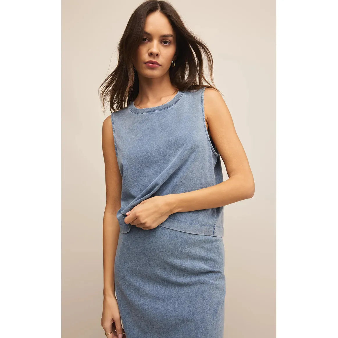 Elevate your style with the Z Supply Sloane Washed Jersey Tank, featuring a lightweight denim look and soft feel.