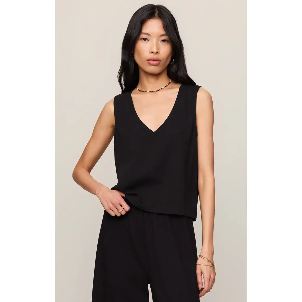 Z Supply Sloane V-Neck Tank in black, sleeveless relaxed-fit V-neck top with matching pants.