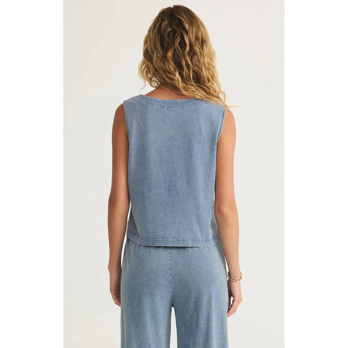 Z Supply Solace V-Neck Jersey Denim Tank showcases a relaxed fit and vintage charm, perfect for casual styling.