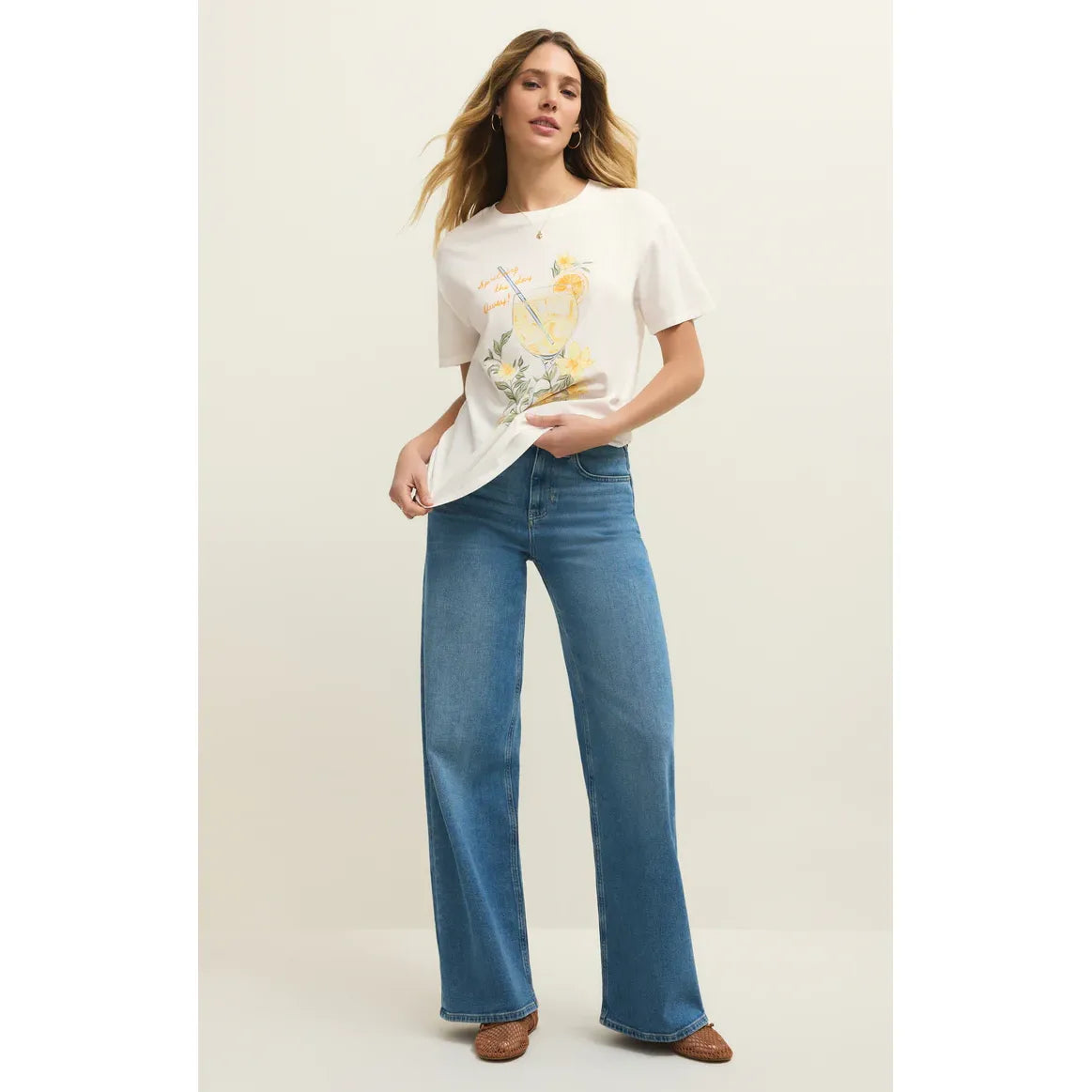 Wearing Z Supply Spritz Boyfriend Tee: white cotton jersey with citrus spritz graphic, floral details, relaxed fit.