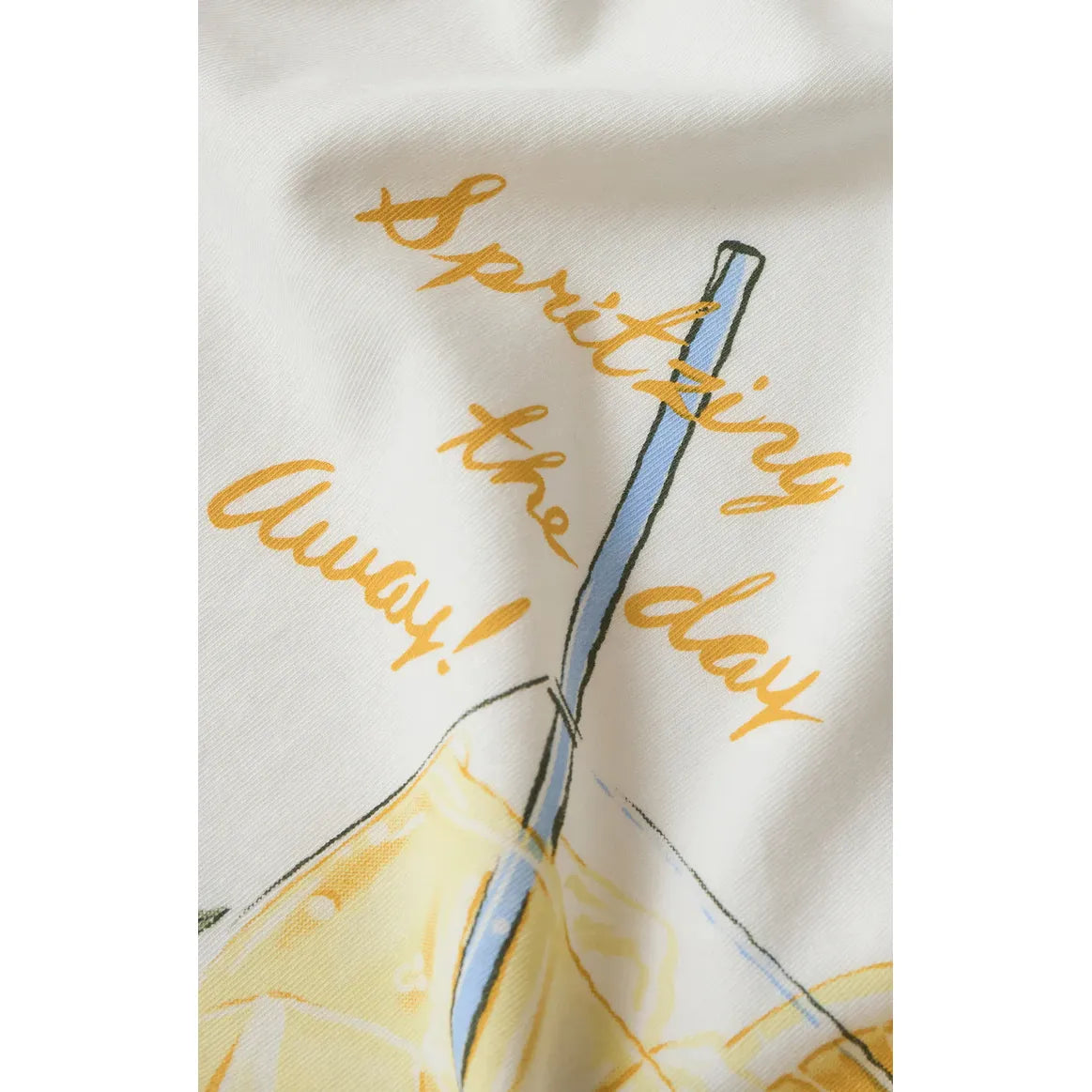 Z Supply Spritz Boyfriend Tee with orange cursive spritzing the day away text and a blue straw on soft cotton jersey.