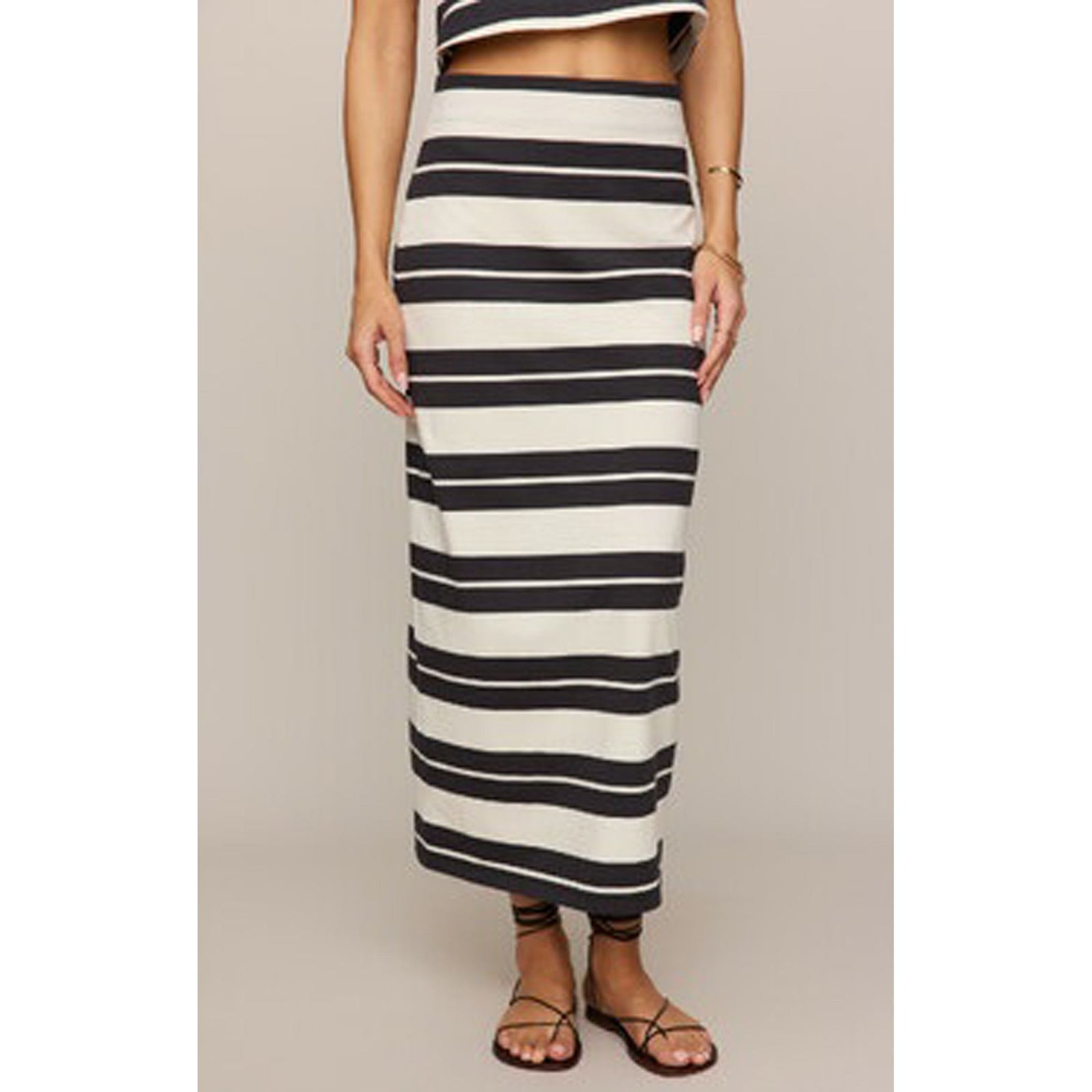 Z Supply Gail Striped Midi Skirt on a model, black and white horizontal stripes, midi length.