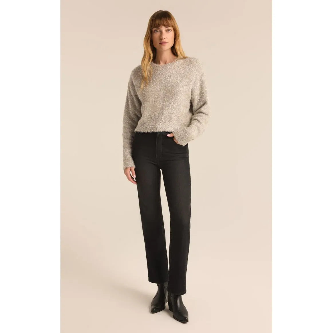 Z Supply Tinseltown Crop Sweater on a model: cream fuzzy knit, crew neck, cropped silhouette, black jeans.