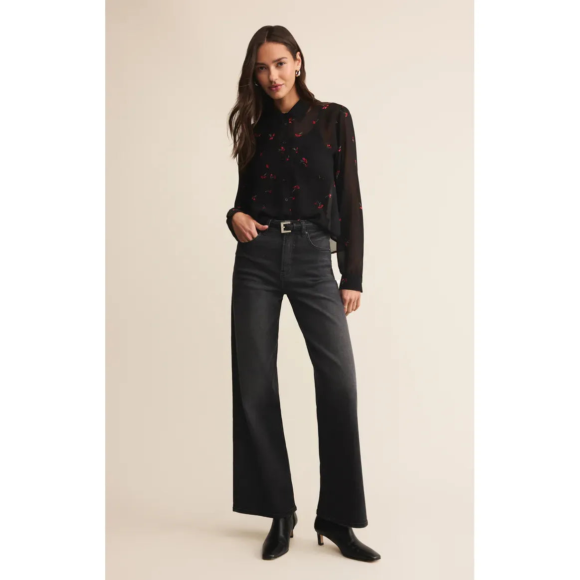 Model in Z Supply Vivienne Rio Floral Top: black sheer crepe, red floral print, loose button-up.