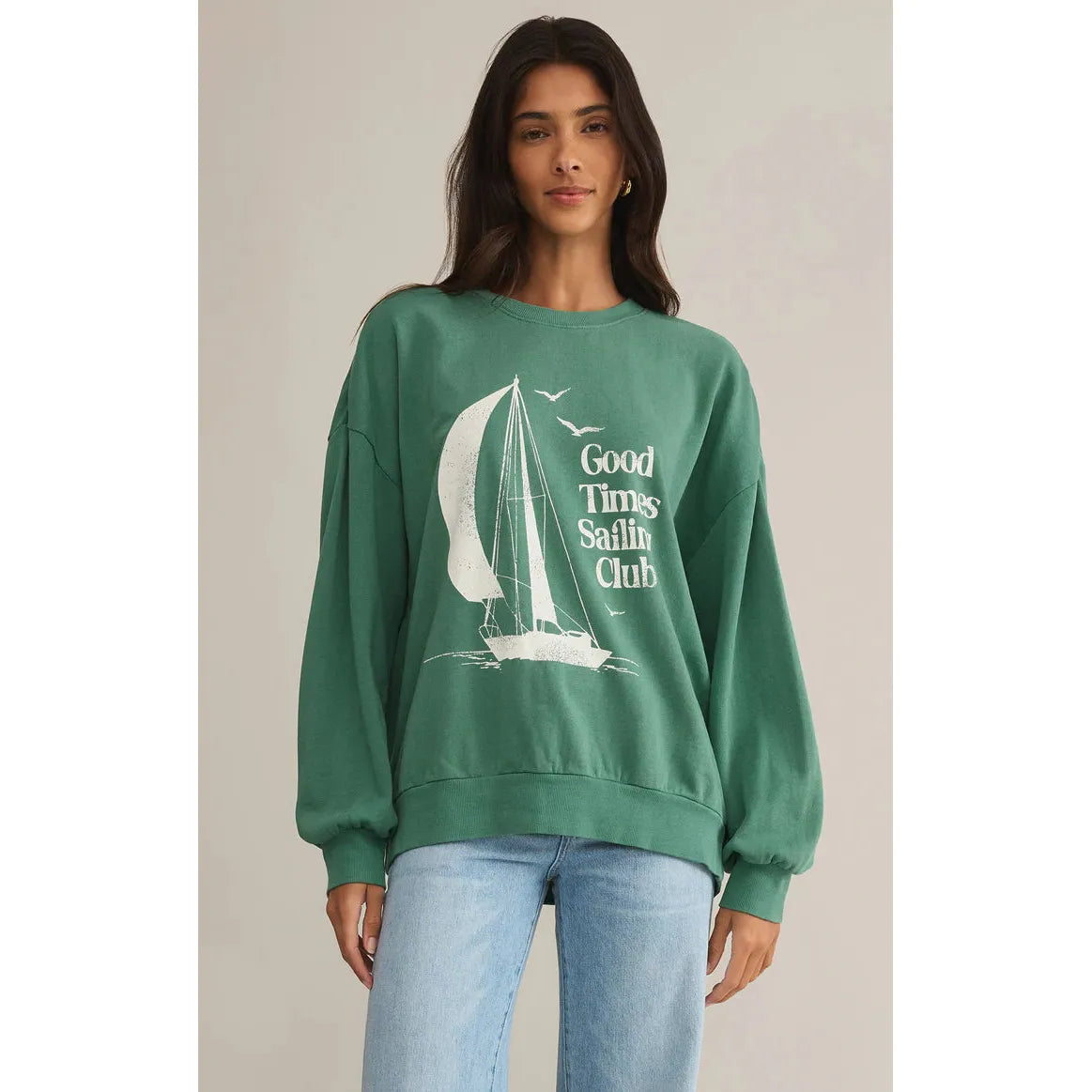 Cozy up in the Z Supply Sail Away Sunday Sweat Shirt, featuring a breezy sailboat design for relaxed days.