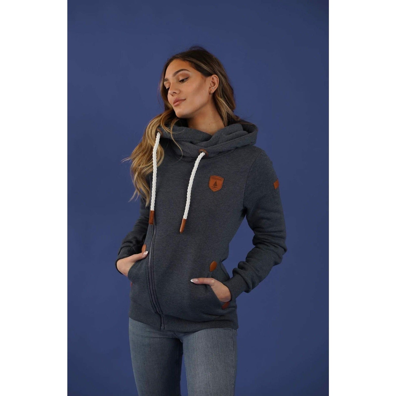 Stylish Wanakome Athena Hoodie features a shawl neck, asymmetrical zip, and faux leather accents, perfect for layering.