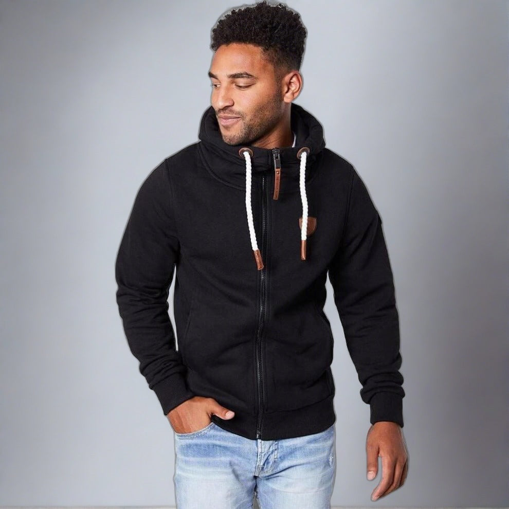 Wanakome Zeus Hoodie: black full-zip hoodie with white rope drawstrings and leather accents.