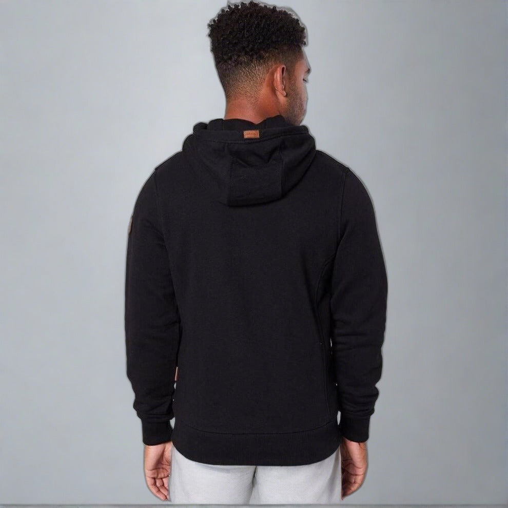 Back view of Wanakome Zeus Hoodie in black worn by a man.